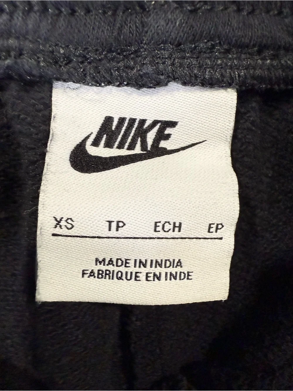 Nike Kids Black Jogger Sweatpants with White Swoosh